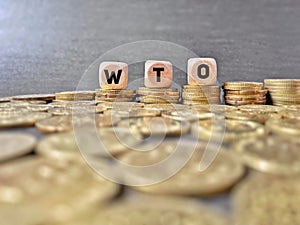 Finance Concept - WTO on wooden cubes. Stands for World Trade Organization.ÃÂ 